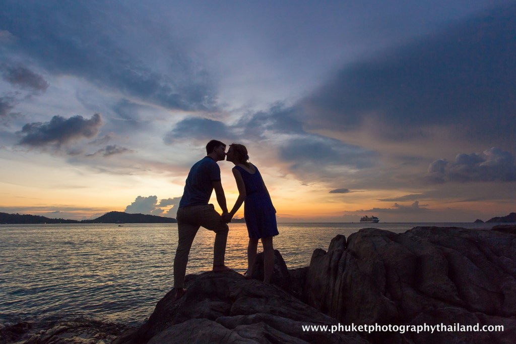 couple at kalim beach , phuket , thailand