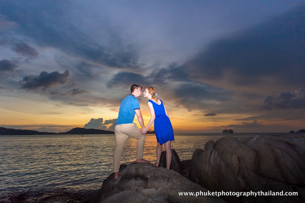 couple at kalim beach , phuket , thailand
