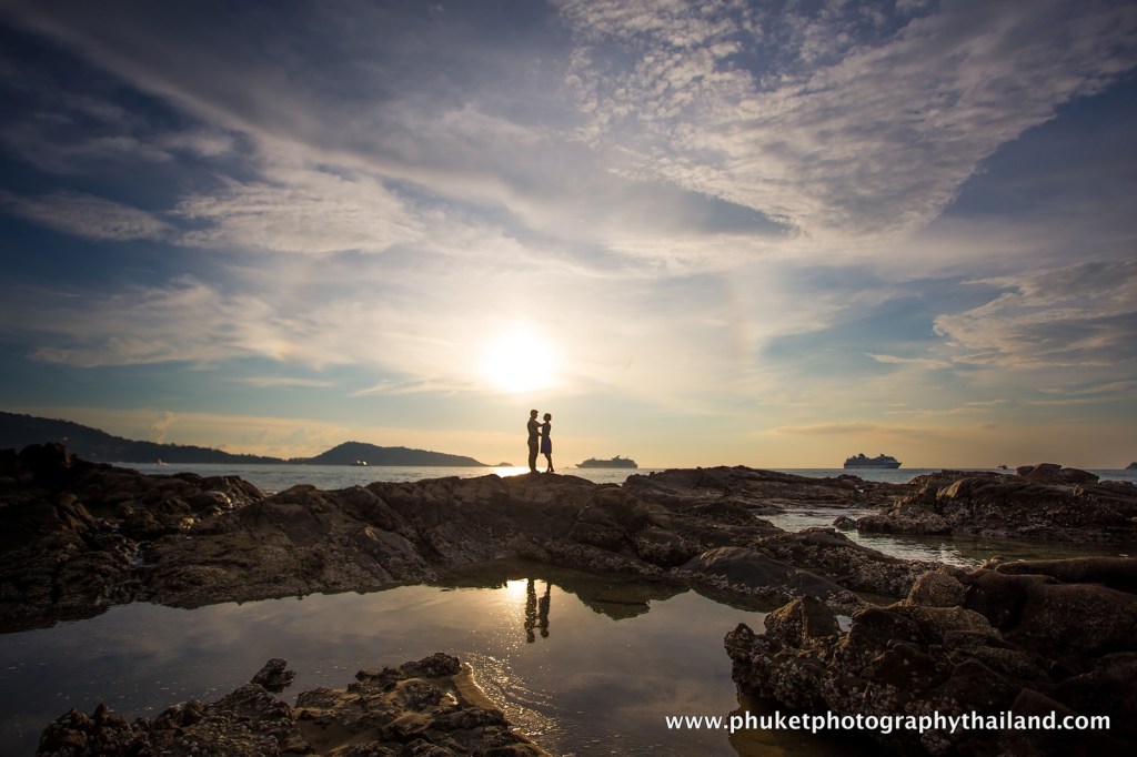 couple at kalim beach , phuket , thailand