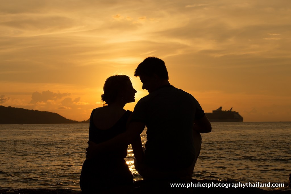 couple at kalim beach , phuket , thailand