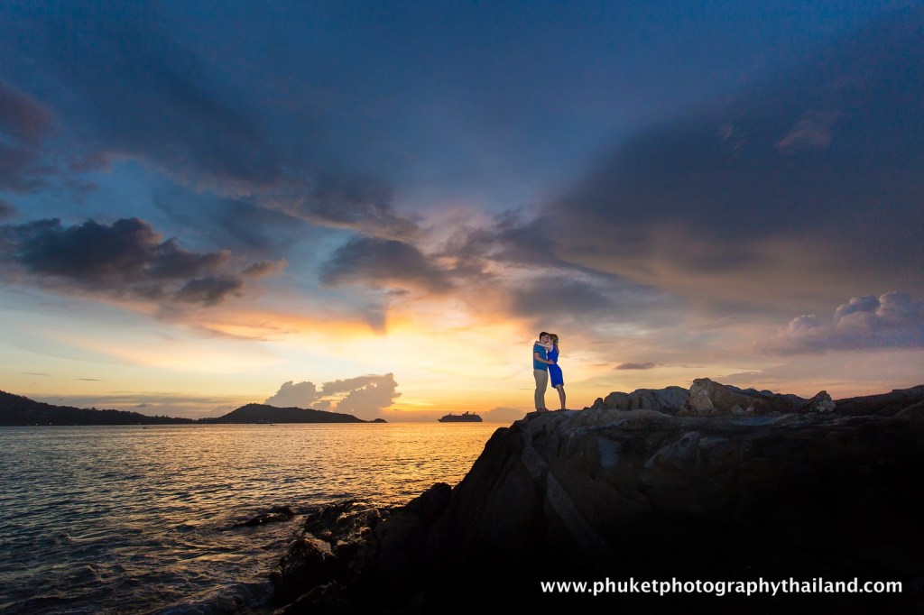 couple at kalim beach , phuket , thailand