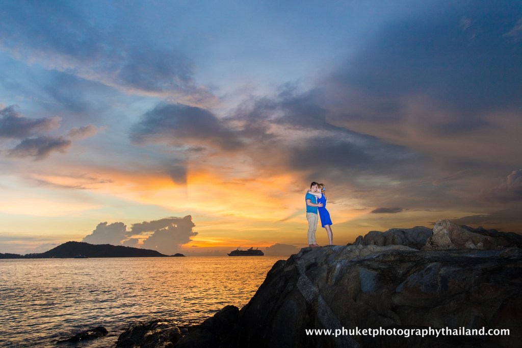 couple at kalim beach , phuket , thailand