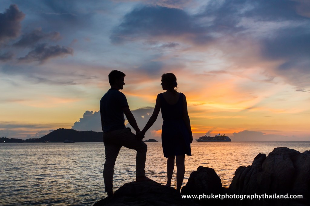 couple at kalim beach , phuket , thailand