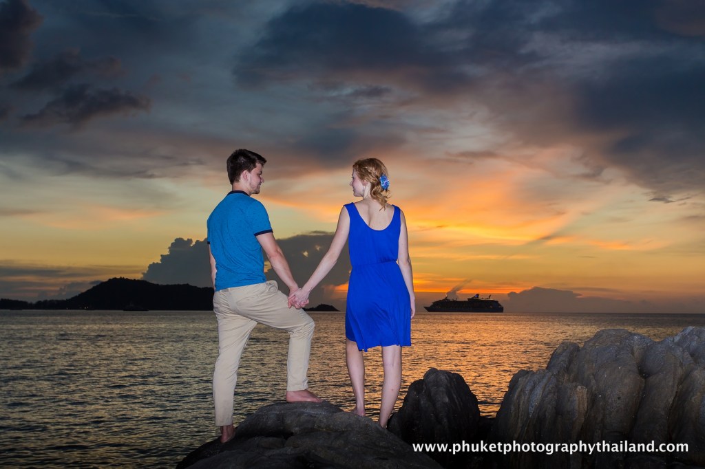 couple at kalim beach , phuket , thailand