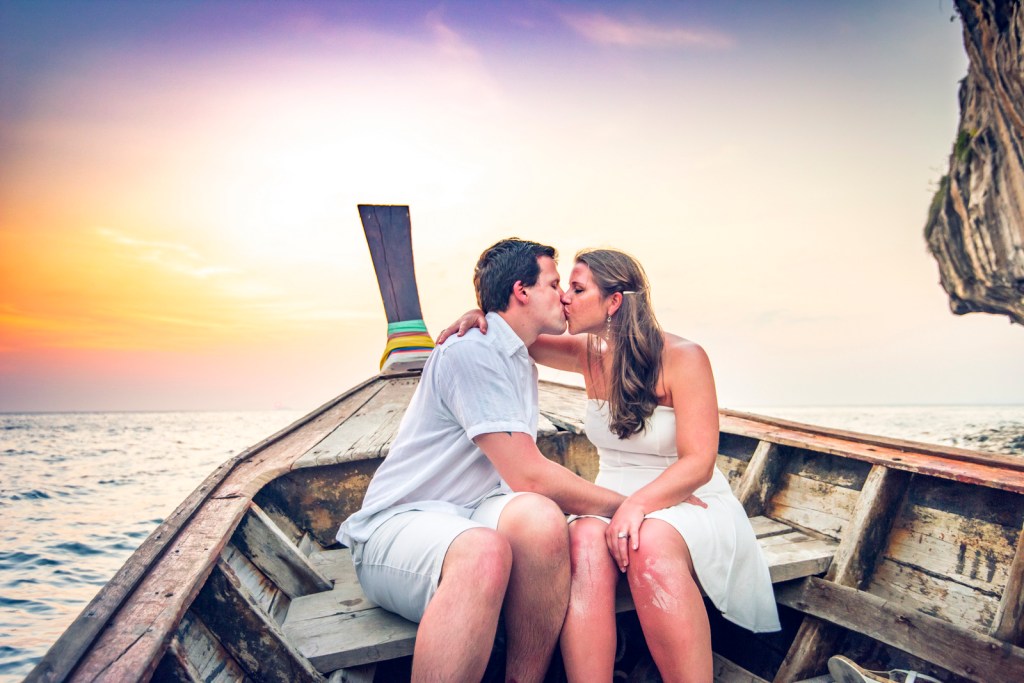 Honeymoon couple photoshoot on long tail boat at Phi Phi Krabi Thailand